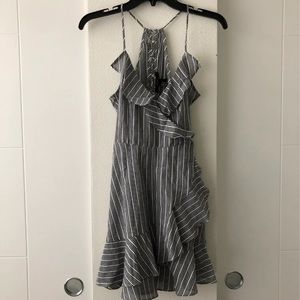 Grey & white striped ruffled dress w/ lace up back & side zip. Like new
